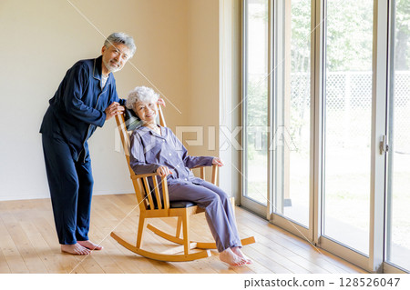 Senior couple relaxing in a nursing home 128526047