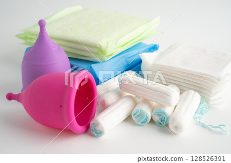 Menstruation cycle with sanitary pad and cotton tampon for woman hygiene and protection. Menstruation cycle with sanitary pad and cotton tampon for woman hygiene and protection. 128526391