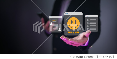 Businessman hand with glowing digital interfaces showing customer satisfaction, feedback, and task management, representing service quality, user experience, and business efficiency. Businessman hand with glowing digital interfaces showing customer satisfaction, feedback, and task management, representing service quality, user experience, and business efficiency. 128526591