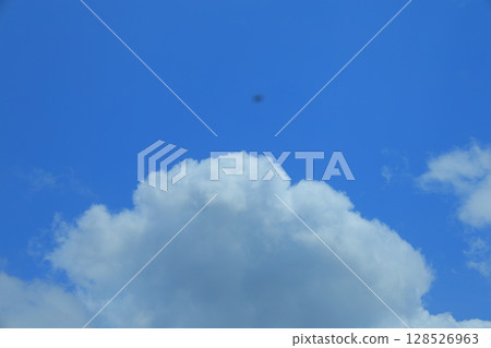 White clouds floating in the blue sky 128526963