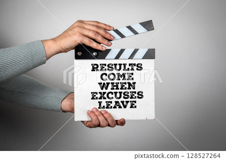 Results Come When Excuses Leave. Film Clapperboard Held by Hands Results Come When Excuses Leave. Film Clapperboard Held by Hands 128527264