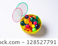 Colorful super balls and poi in a cup 128527791