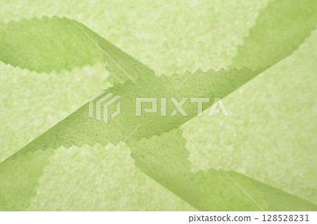 Yellow-green gradation made of washi paper [Background material] 128528231