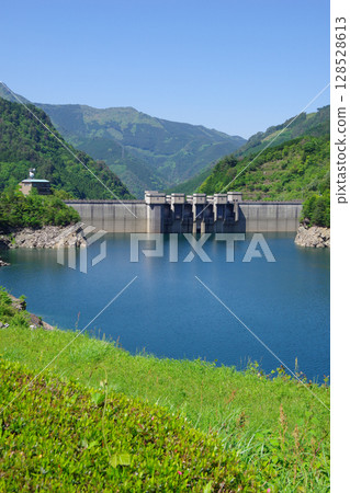 View of Tomisato Dam from Seino Observation Plaza in Shikokuchuo City, Ehime Prefecture 128528613