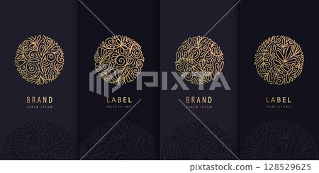 Vector set of floral circle line logos, golden spa plant design, round tea herbal labels. Beauty swirl flower icons, nature emblems. Vector set of floral circle line logos, golden spa plant design, round tea herbal labels. Beauty swirl flower icons, nature emblems. 128529625