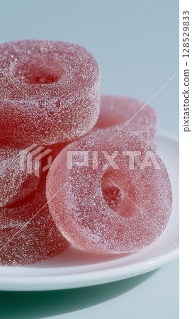 Crystal Clear Pink Peaches with Translucent Texture on White Plate in Minimalist INS Style 128529833