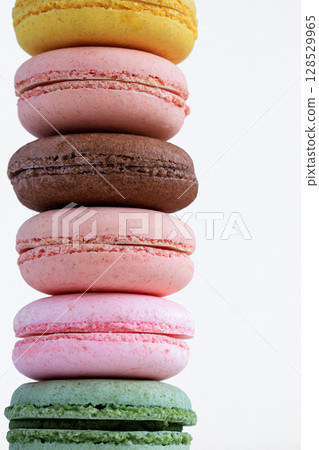 Colorful macarons on a white background 128529965