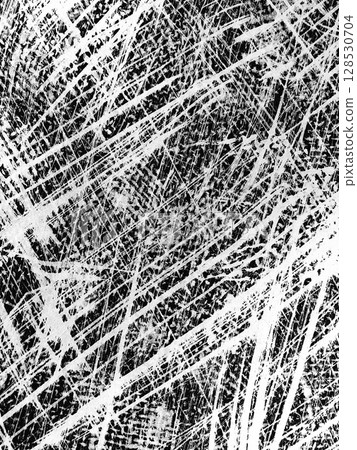 Intricate patterns of scratched lines and textures create a dynamic contrast between black and white. The artwork showcases chaotic yet captivating design elements. 128530704