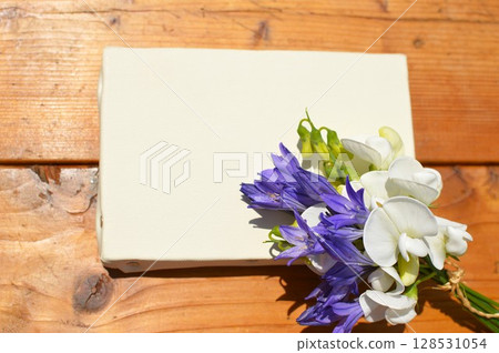 Blue-purple triteria and white summer sweet pea on canvas Blue-purple triteria and white summer sweet pea on canvas 128531054