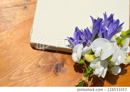 Blue-purple triteria and white summer sweet pea on canvas 128531057