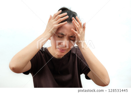 Woman Suffering from Severe Experiencing Migraine Headache in Distress Woman Suffering from Severe Experiencing Migraine Headache in Distress 128531445