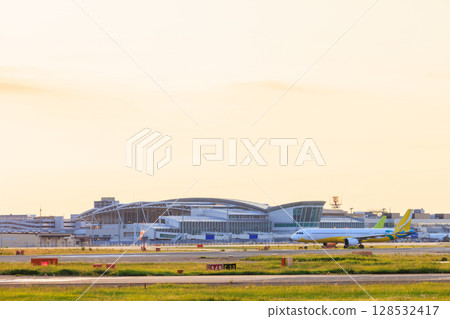Fukuoka Airport at dusk in summer, Fukuoka City, Fukuoka Prefecture Fukuoka Airport at dusk in summer, Fukuoka City, Fukuoka Prefecture 128532417