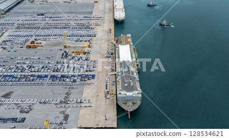 Aerial view vehicles carrier and new cars for import export transportation logistic, Vehicles carrier at industrial RoRo terminal port, Vehicles carrier global business logistic import export new car 128534621