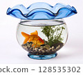 Goldfish in a fish bowl 128535302