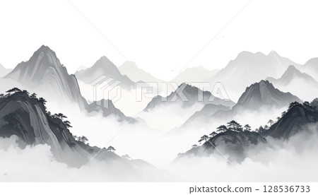 A snow-covered Japanese castle stands in a mountainous forest landscape in winter under a cloudy blue sky 128536733