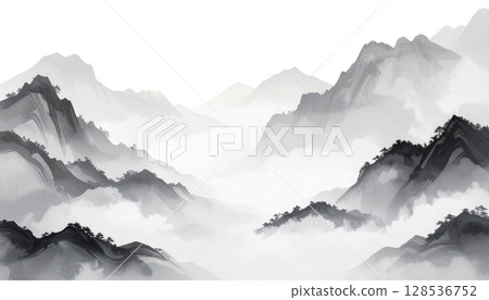 A snow-covered Japanese castle stands in a mountainous forest landscape in winter under a cloudy blue sky 128536752