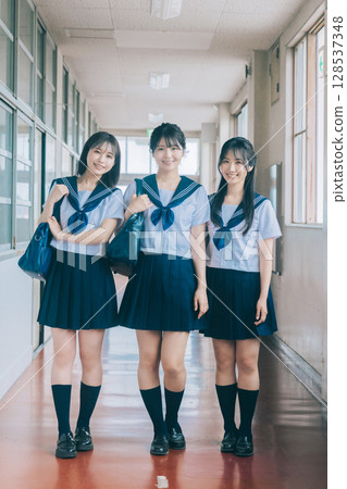 Three high school girls Three high school girls 128537348