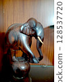 Wooden Elephant Displaying Acrobatics 128537720