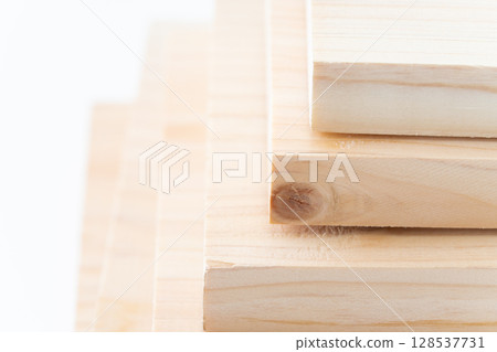 Close-up of cross sections of boards (wood) of various sizes 128537731