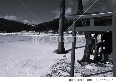 Tono in winter, Kamaishi Line and a small shrine Tono in winter, Kamaishi Line and a small shrine 128537907