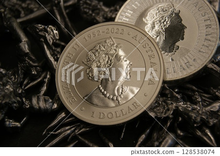 Investment coins on silver pieces.1 dollar close up. 128538074