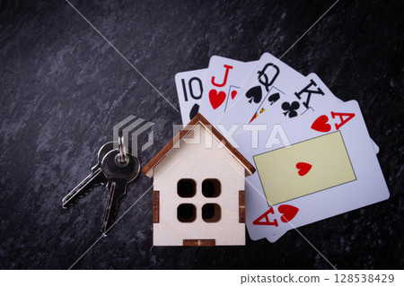 House on the line in the casino. Losing at home in poker. 128538429