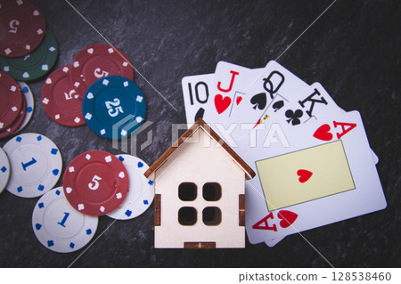 House on the line in the casino. Losing at home in poker. 128538460