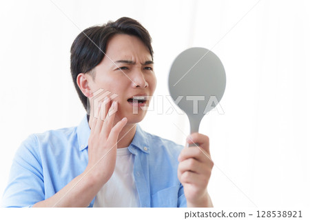 Men suffering from rough skin 128538921