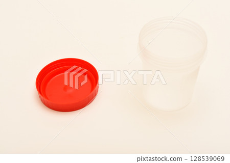 Jars for urine and fecal tests. Containers for medical tests. 128539069