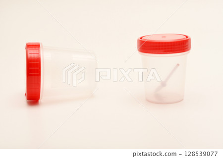 Jars for urine and fecal tests. Containers for medical tests. 128539077