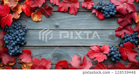 Vibrant Autumn Leaves on Concrete Background 128539448