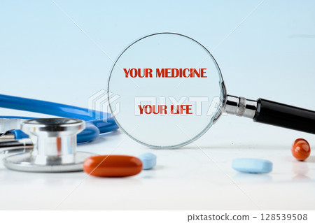 The conceptual phrase is YOUR MEDICINE YOUR LIFE. Invest in your health Concept. 128539508