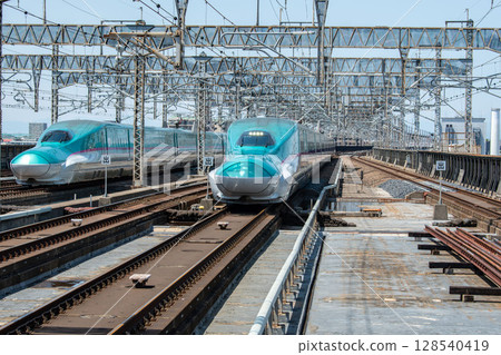 Tohoku Aomori Shinkansen E5 series crossing on both up and down lines 128540419