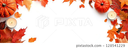 Autumn Flat Lay with Pumpkins, Candles, and Leaves 128541229