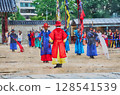 The changing of the gates ceremony at Gyeongbokgung Palace in Seoul, where the guards perform in beautiful costumes (AI generated from original images) 128541539