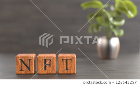 刻有「NFT」字樣的木塊的 3D 插圖 128543257