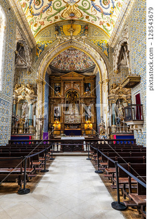 Coimbra , Portugal - Mar 14, 2025: Sao Miguel Chapel is a chapel of University of Coimbra, Portugal 128543679