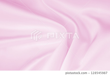 Smooth elegant pink silk or satin texture as wedding background. Luxurious valentine day background design 128545987