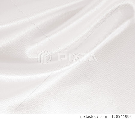 Smooth elegant golden silk or satin luxury cloth texture as wedding background. Luxurious background design. In Sepia toned. Retro style 128545995