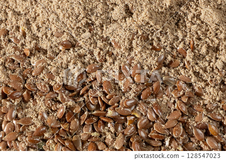Flax Seeds and Ground Flaxseed Flour Macro View. 128547023