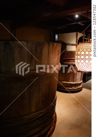 Old brewing vats and lighting Old brewing vats and lighting 128547382