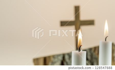 Wooden cross with white candles on gradient background with copy space. Religion background suitable for faith religion, christian holidays, Easter, Redeemer, the Feast of Corpus Christi 128547888