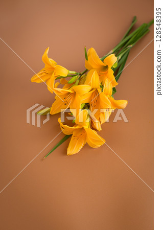 Soft golden petals of lilies in composition Soft golden petals of lilies in composition 128548395