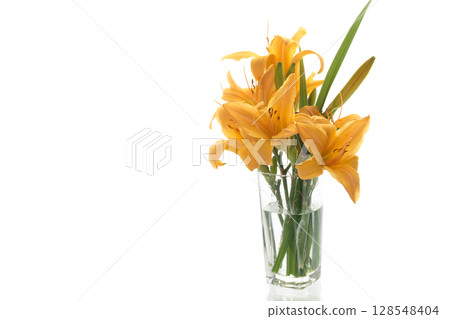Fresh bouquet of orange lilies isolated on white Fresh bouquet of orange lilies isolated on white 128548404