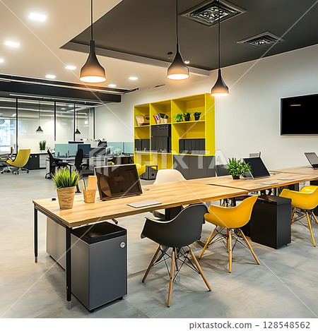 A modern office space with yellow shelves and wooden desks A modern office space with yellow shelves and wooden desks 128548562