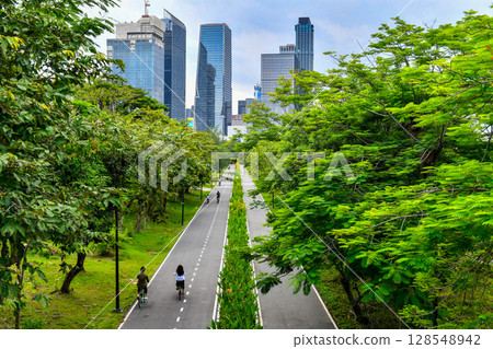High angle view of the cycling and jogging paths in Benjakitti Park at evening, Bangkok, Thailand.	 128548942