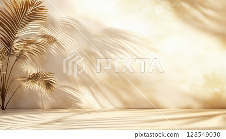 Blurry Shadows Cast By Palm Leaves On A Light Cream Wall 128549030