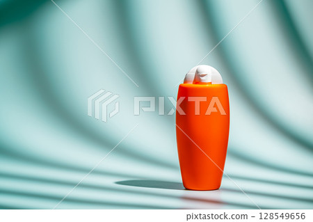 Sunscreen spf orange bottle 128549656