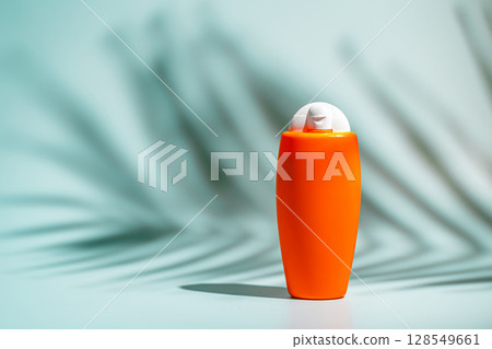 Sunscreen spf orange bottle Sunscreen spf orange bottle 128549661