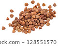 Heap of Raw Buckwheat Kernels Isolated on a White Background 128551570